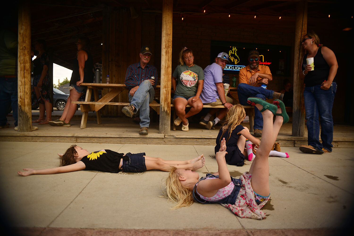 Timber Smith, 4, kicks her feet up in the air